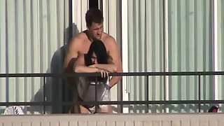 Couple caught nailing on high rise balcony
