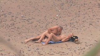 Mature couple public sex on beach caught on voyeur camera lens
