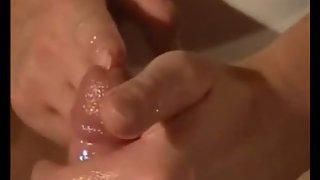 Oiled up handjob vid with pearly cum shot