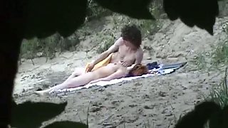 Hidden cam camera grasping couple on beach having sex in public