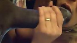 Wife gorging on a thick black penis